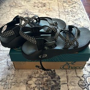 Woman’s U.S. size 9 black Chacos.